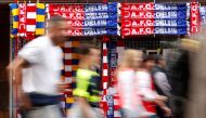 General view of scarves for sale outside the stadium before the match  (Reuters / John Sibley)