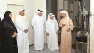 Eng. Abdulla Al Mehshadi, (centre) Chief Executive Officer of Msheireb Properties; Hafiz Ali, (second left) Director of Msheireb Museums; with other officials visiting the Exhibition Hall during the opening of the Second Edition of “Strange Wonders” Exhib