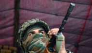 An Indian Border Security Force soldier on duty in Srinagar, Kashmir. AFP Photo/Tauseef Mustafa