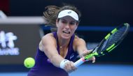 Johanna Konta of Britain hits a return against Madison Keys of the US during their women's singles semi-final match at the China Open tennis tournament in Beijing on October 8, 2016. (AFP / WANG ZHAO)