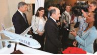 Qatar Airways Group Chief Executive Akbar Al Baker (centre) discusses the agreement with reporters following a press conference co-hosted with Boeing Commercial Airplanes President and CEO Ray Conner.