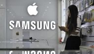 File photo of a store featuring company logos of Apple and Samsung. Reuters/Stringer
