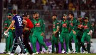 Bangladesh players exchange words with England's Jos Buttler after he was bowled out during the second One Day International. (Reuters/Cathal McNaughton)