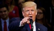 Republican presidential nominee Donald Trump speaks during a rally at Mohegan Sun Arena in Wilkes-Barre, Pennsylvania on October 10, 2016. / AFP / DOMINICK REUTER