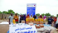 Refugees in Chad with the aid supplies from RAF.