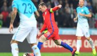England's Wayne Rooney leads a ball during the World Cup 2018 football qualification match between Slovenia and England in Ljubljana on October 11, 2016. / AFP / JOE KLAMAR
