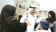 Sheikh Thani bin Abdullah Al Thani, Chairman of Qatar Society for Rehabilitation of Special Needs (QSRSN), being honoured by the Gulf Disability Society (GDS) officials at the headquarters of QSRSN.