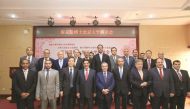 H E Dr Hamad bin Abdulaziz Al Kawari, Cultural Adviser at the Emiri Diwan and Qatar’s candidate for the post of Director-General of Unesco, with officials at the Peking University (PKU) in Beijing. 