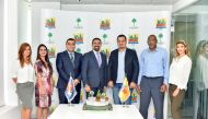 KidzMondo Doha and Palmera Landscapes officials after signing the agreement.