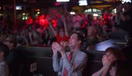 People react at The Abbey bar while watching the third and final presidential debate between Republican Donald Trump and Democrat Hillary Clinton on October 19, 2016 in West Hollywood, California. David McNew/Getty Images/AFP