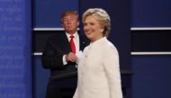 Republican U.S. presidential nominee Donald Trump and Democratic U.S. presidential nominee Hillary Clinton finish their third and final 2016 presidential campaign debate at UNLV in Las Vegas, Nevada, U.S., October 19, 2016. REUTERS/Mike Blake