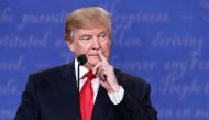 Republican presidential nominee Donald Trump gestures as he speaks during the third U.S. presidential debate at the Thomas & Mack Center on October 19, 2016 in Las Vegas, Nevada. Win McNamee/Getty Images/AFP