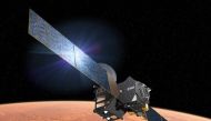 This file photo handout photo taken from the European Space Agency website on March 1, 2016 shows an artist's impression depicting the separation of the ExoMars 2016 entry, descent and landing demonstrator module, named Schiaparelli, from the Trace Gas Or