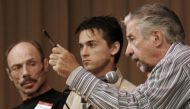 American peace activist Tom Hayden (R) takes part in a reunion of Vietnam War draft dodgers and deserters being held in Castlegar, British Columbia in this file photo dated July 7, 2006. REUTERS/Andy Clark (CANADA)