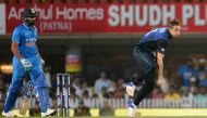 New Zealand's Tim Southee (R) bowls as Indian batsman Rohit Sharma looks on during the fourth one day international (ODI) match between India and New Zealand at The Jharkhand State Cricket Association (JSCA) stadium complex in Ranchi on October 26, 2016. 