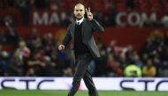 Manchester City's Spanish manager Pep Guardiola gestures on the pitch after the EFL (English Football League) Cup fourth round match between Manchester United and Manchester City at Old Trafford in Manchester, north west England on October 26, 2016. AFP /