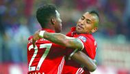 Bayern Munich’s David Alaba and Arturo Vidal react after scoring a goal against FC Augsburg during their match in German Cup (DFB Pokal) at Allianz Arena, Munich, Germany on Wednesday.