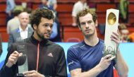 Andy Murray of Great Britain (right) poses after winning the final match against Jo-Wilfried Tsonga of France at the ATP Erste Bank Open Tennis tournament in Vienna, yesterday.