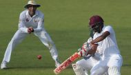 West Indies' batsman Kraigg Brathwaite playa a shot on the fourth day of the third and final Test between Pakistan and the West Indies at the Sharjah Cricket Stadium in Sharjah on November 2, 2016. (AFP / AAMIR QURESHI)