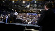 U.S. President Barack Obama (L) delivers remarks at a Hillary for America campaign event at Florida International University in Miami, Florida, U.S. November 3, 2016. REUTERS/Jonathan Ernst