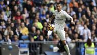Real Madrid's Portuguese forward Cristiano Ronaldo controls a ball during the Spanish league football match Real Madrid CF vs Club Deportivo Leganes SAD at the Santiago Bernabeu stadium in Madrid on November 6, 2016. / AFP / JAVIER SORIANO
