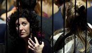 A woman watches voting results come in at Democratic presidential nominee former Secretary of State Hillary Clinton's election night event at the Jacob K. Javits Convention Center November 8, 2016 in New York City. Elsa/Getty Images/AFP