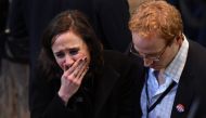Supporter of Democratic presidential nominee Hillary Clinton react to television reports during election night at the Jacob K Javits Convention Center in New York on November 8, 2016. AFP / Robyn BECK