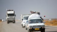 NINEVEH, IRAQ - NOVEMBER 8: Internally relocated people fleeing from the villages and neighborhoods from eastern Mosul arrive at the check point at the Bartella front in Nineveh, Iraq on November 8, 2016 as the operation to liberate Mosul from IS continue