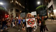People march while protesting the election of Republican Donald Trump as the president of the United States in downtown Los Angeles, California U.S., November 9, 2016. REUTERS/Mario Anzuoni
