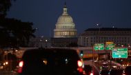 US President Barack Obama's motorcade drives towards US Capitol in Washington after playing golf on November 12, 2016. (AFP / YURI GRIPAS)