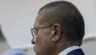 Russian Economy Minister Alexei Ulyukayev, who was detained by law enforcement officials on corruption charges, is escorted upon his arrival for a hearing at the Basmanny district court in Moscow, Russia, on November, 15, 2016. (Nikita Shvetsov - Anadolu 