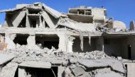 Debris of the collapsed buildings are seen after the Assad Regime's and Russian forces' airstrikes over residential areas in Maadi Neighborhood of Aleppo, Syria on November 17, 2016. (Ibrahim Ebu Leys - Anadolu Agency)