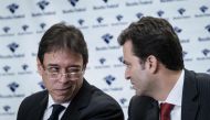 Federal Police regional superintendent Mario Semprine (L) and Federal Police delegate Tacio Muzzi talk during a press conference related to Operation Lava Jato (