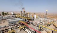 A flame rises from a chimney at Taq Taq oil field in Arbil, in Iraq's Kurdistan region, August 16, 2014. REUTERS/Azad Lashkari