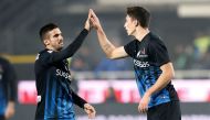 Atalanta's Mattia Caldara celebrates with teammate Marco D'Alessandro after scoring against AS Roma. REUTERS/Alessandro Garofalo