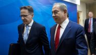 Israeli Prime Minister Benjamin Netanyahu (R) and the new cabinet secretary, Tzachi Braverman, arrive to the weekly cabinet meeting in Jerusalem November 20, 2016. REUTERS/Menahem Kahana