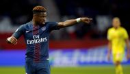 Paris St Germain's Serge Aurier reacts in match against against Nantes. REUTERS/Gonzalo Fuentes

