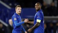  Leicester City's Jamie Vardy and Wes Morgan (R) shake hands as they celebrate at full time. (Reuters / Carl Recine Livepic)