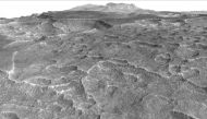 This vertically exaggerated view shows scalloped depressions in a part of Mars where such textures prompted researchers to check for buried ice, using ground-penetrating radar aboard NASA's Mars Reconnaissance Orbiter. NASA/JPL-Caltech/Univ. of Arizona
