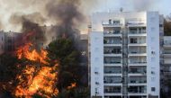 A picture taken on November 24, 2016 shows a fire raging in the northern Israeli port city of Haifa.  AFP / JACK GUEZ
