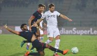 Northeast United FC forward Emiliano Alfaro (R) vies for the ball with Delhi Dynamos FC defender Anas Edathodika during the Indian Super League (ISL) football match between North East United FC and Delhi Dynamos FC at the Indira Gandhi Athletic Stadium in