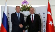 Russian Foreign Minister Sergei Lavrov shakes hands with his Turkish counterpart Mevlut Cavusoglu in Alanya, Turkey, December 1, 2016. REUTERS/Stringer EDITORIAL USE ONLY. NO RESALES. NO ARCHIVE.

