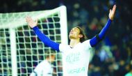 Paris Saint-Germain's Edinson Cavani reacts after scoring a goal against Angers during their Ligue 1 match at Parc des Princes in Paris, France on Wednesday. 