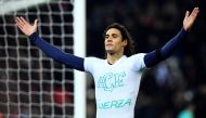 Paris Saint-Germain's Uruguayan forward Edinson Cavani (C) celebrates after scoring a goal during the French L1 football match between Paris Saint-Germain and Angers at the Parc des Princes stadium in Paris on November 30, 2016. (AFP / FRANCK FIFE)