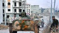 Syrian pro-government forces set up an outpost yesterday in the Aleppo's eastern neighbourhood of Sakan al-Shababi after they retook from rebel fighters.