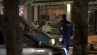 Police investigators work at the area were three people were killed in a shooting incident at a restaurant in Imatra, Eastern Finland after midnight on December 4, 2016. / Reuters.
