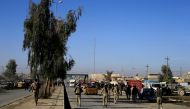 Iraqi security forces are seen in the street of Gogjali neighborhood in Mosul, Iraq, December 4, 2016. REUTERS/Thaier Al-Sudani