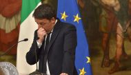 Italy's Prime Minister Matteo Renzi announces his resignation during a press conference at the Palazzo Chigi following the results of the vote for a referendum on constitutional reforms, on December 4, 2016 in Rome. AFP / Andreas SOLARO
