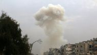 Smoke rises after strikes on the rebel-held besieged neighbourhoods of eastern Aleppo, Syria December 5, 2016. REUTERS/Abdalrhman Ismail
