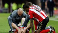 Sunderland's Duncan Watmore receives medical attention Reuters / Russell Cheyne 